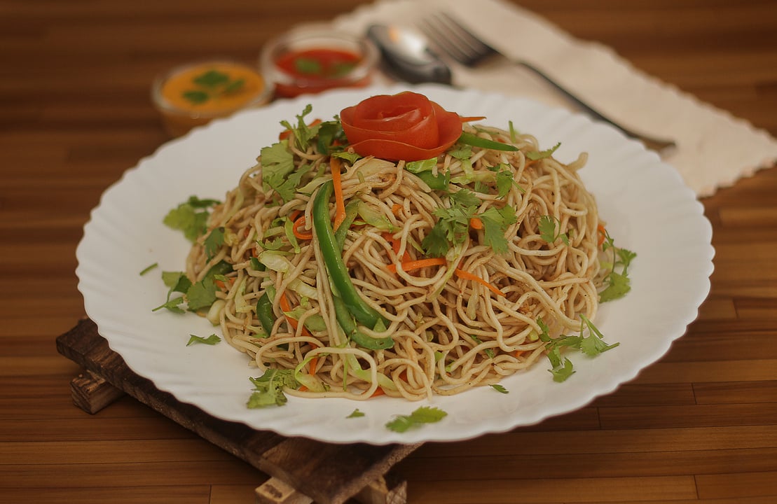 Noodles On White Ceramic Plate